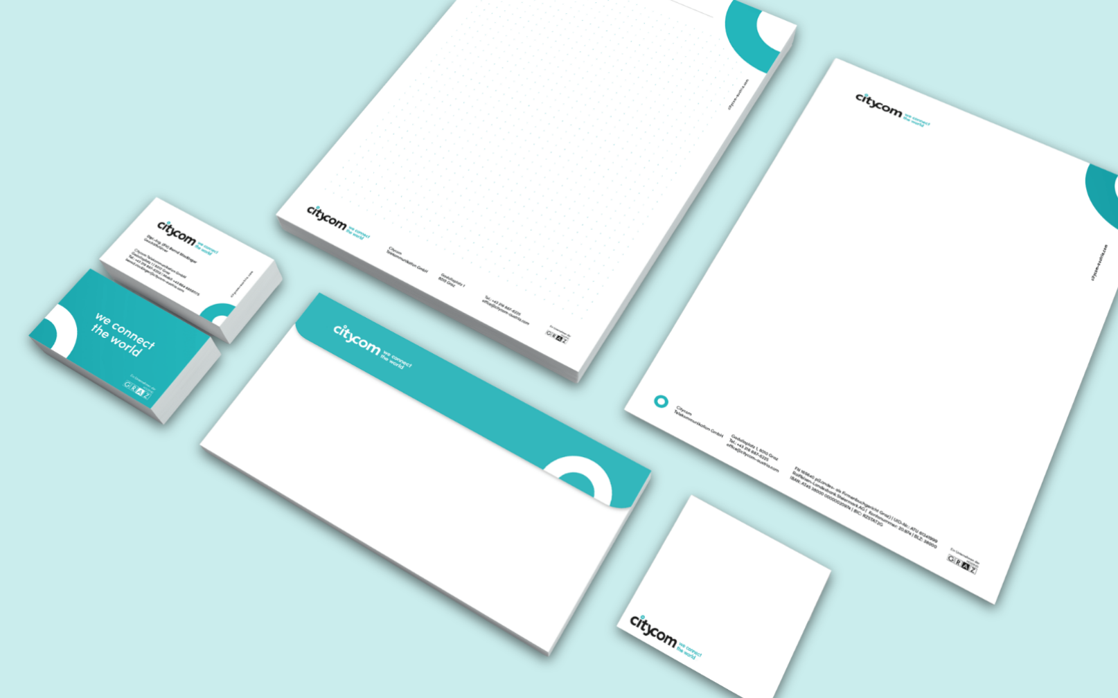 Citycom Geschäftsdrucksorten: Schreibblock, Briefpapier, Kuvert und Visitenkarte.